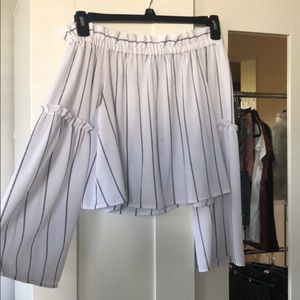 Over the shoulder white and black striped top